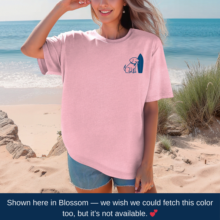Lifestyle photo of coastal dog mom t-shirt with embroidered Labrador-inspired surfboard design – Tail & Tide Co
